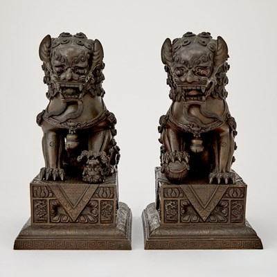 Lot 125 - A Pair of Chinese Bronze Fu Lions and Stands