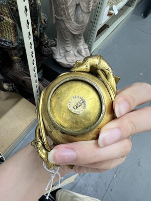 Lot 97 - A Chinese Gilt Bronze Twin-Handled ‘Chilong’ Cup