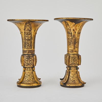 Lot 102 - A Rare Pair of Chinese Parcel Gilt Bronze Archaistic Gu Vases