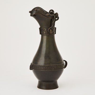 Lot 118 - A Chinese Archaistic Bronze Pouring Vessel