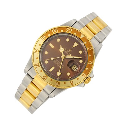 Lot 33 - Rolex Gentleman's Stainless Steel and Gold 'GMT Master-Date' Wristwatch, Ref. 16753