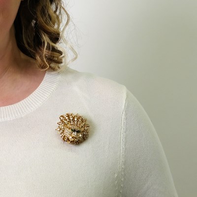 Lot 79 - Van Cleef & Arpels Gold, Diamond and Emerald Lion Head Clip-Brooch