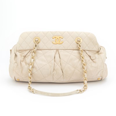 Lot 198 - Chanel Iridescent Beige Suede Quilted Bowling Bag