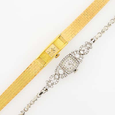 Lot 2303 - Two Yellow and White Gold, Platinum and Diamond Wristwatches