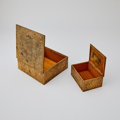 Lot 375 - Two Tiffany Studios Gilt-Bronze Zodiac Pattern Desk Boxes