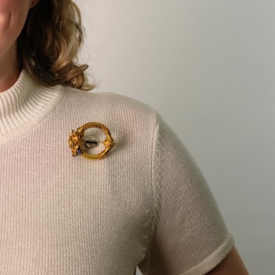 Lot 70 - Etruscan Revival Gold, Sapphire and Diamond Animal Head Circle Brooch