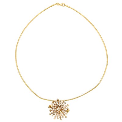 Lot 1221 - Gold and Diamond Starburst Pendant-Necklace