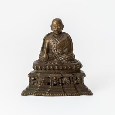 Lot 747 - A Tibetan Bronze Figure of a Lama