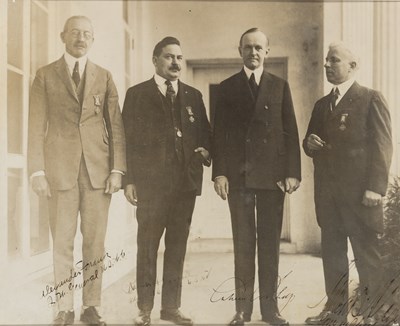Lot 82 - Signed photograph depicting Calvin Coolidge with United Spanish War Veterans.