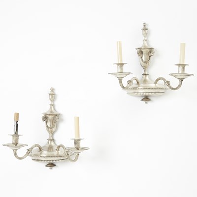 Lot 719 - Pair of Neoclassical Style Silvered Metal Two-Light Wall Lights