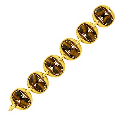 Lot 65 - Gold and Tiger's Eye Link Bracelet