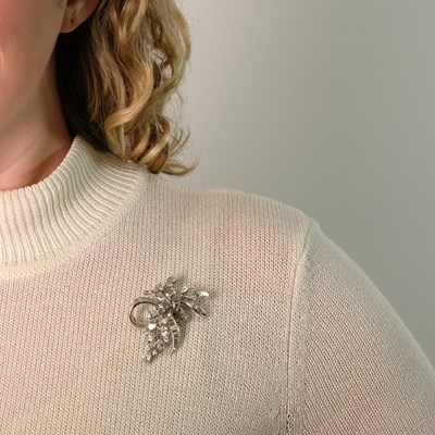 Lot 47 - Platinum and Diamond Ribbon Brooch