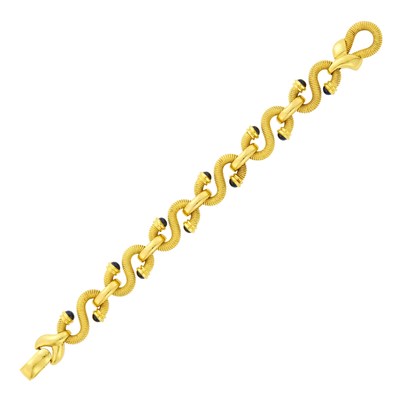 Lot 143 - Gold and Cabochon Sapphire 'S' Link Bracelet