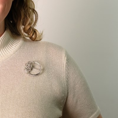 Lot 83 - Platinum, Diamond, Cabochon Sapphire and Simulated Sapphire Circle Brooch