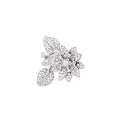 Lot 1070 - White Gold and Diamond Flower Swing Ring