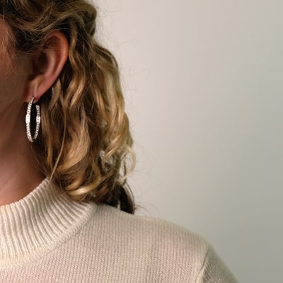 Lot 132 - Cartier Pair of White Gold and Diamond Hoop Earrings