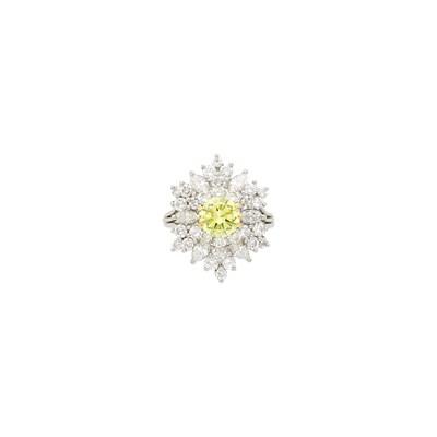 Lot 1078 - Platinum, Fancy Intense Greenish Yellow Diamond and Diamond Ring