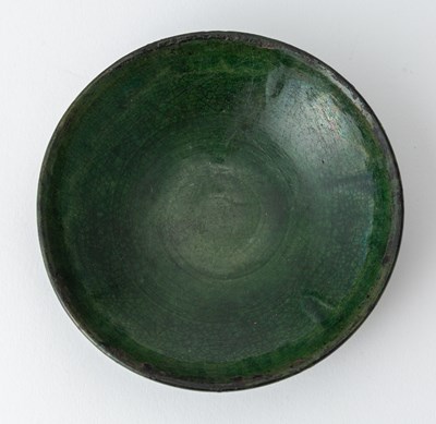 Lot 688 - A Chinese Green Glazed Pottery Bowl