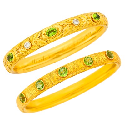 Lot 1027 - Two Antique Gold and Peridot Bangle Bracelets