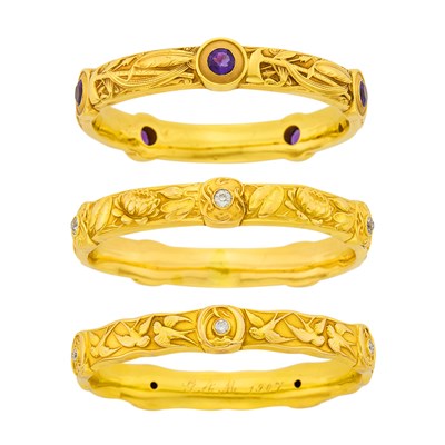 Lot 1029 - Three Antique Gold and Gem-Set Bangle Bracelets