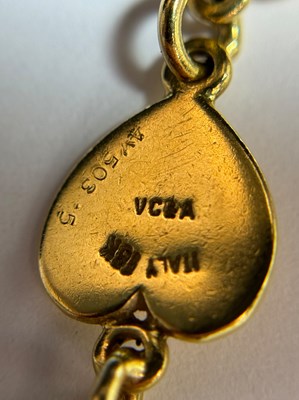 Lot 38 - Van Cleef & Arpels Long Gold and Wood Heart Chain Necklace