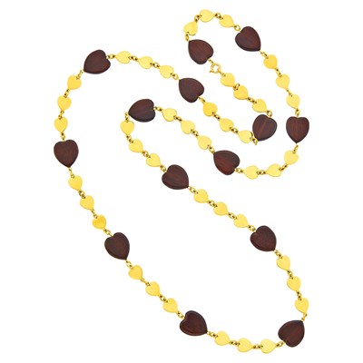 Lot 38 - Van Cleef & Arpels Long Gold and Wood Heart Chain Necklace