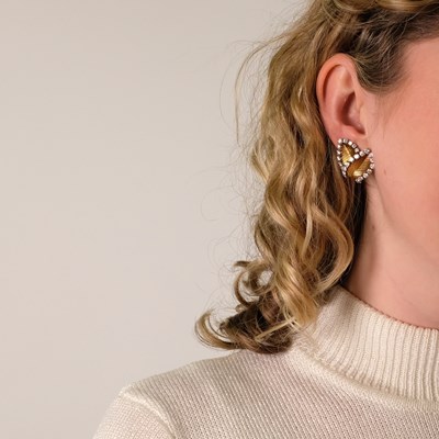 Lot 139 - Neiman Marcus Pair of Gold, Platinum and Diamond Leaf Earclips, France