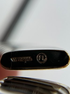 Lot 44 - Weingrill Pair of White Gold and Diamond Bangle Bracelets