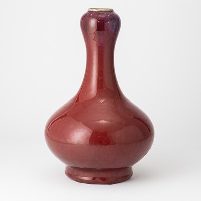 Lot 666 - A Large Chinese Oxblood Glazed Garlic Head Bottle Vase