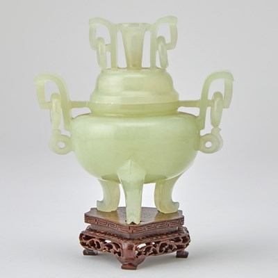 Lot 472 - A Chinese Serpentine Tripod Censer and Cover