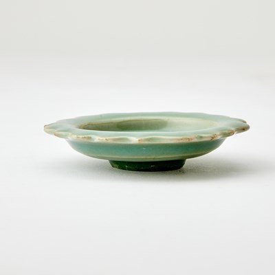 Lot 227 - A Chinese Longquan Celadon Glazed Barbed Rim Dish