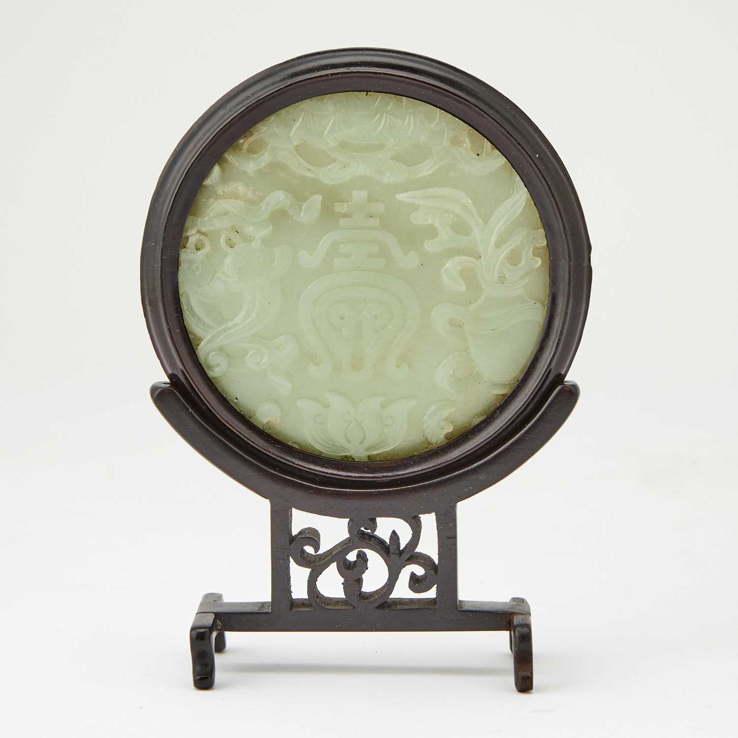 Lot 48 - A Chinese Celadon Jade Circular Table Screen