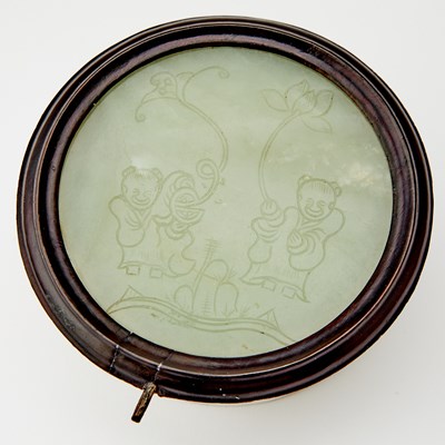 Lot 48 - A Chinese Celadon Jade Circular Table Screen