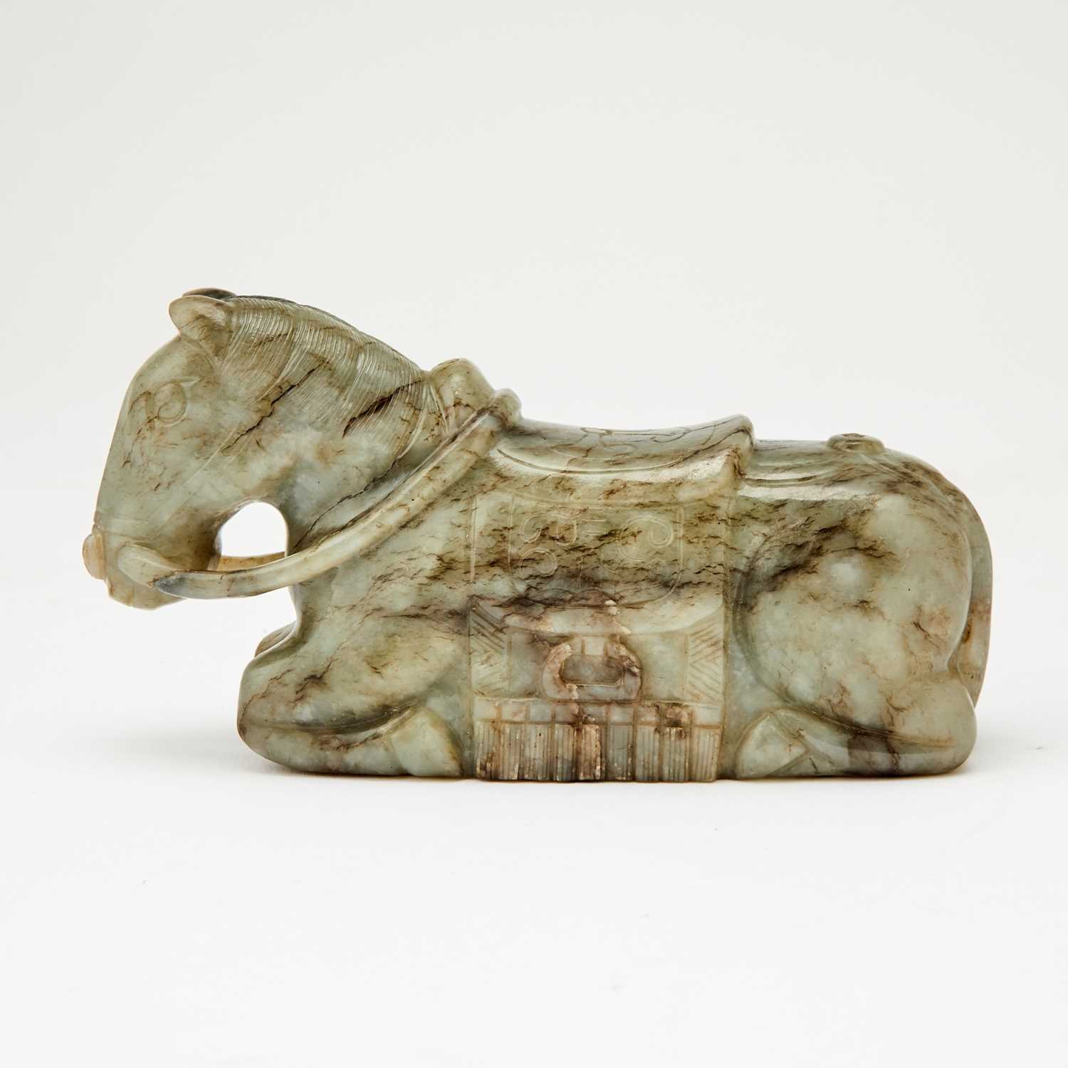 Lot 17 - A Chinese Gray Jade Carving of a Recumbent Horse