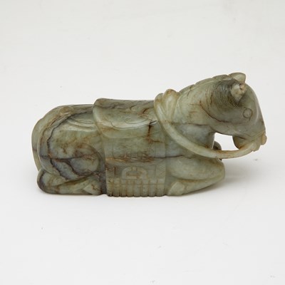 Lot 17 - A Chinese Gray Jade Carving of a Recumbent Horse