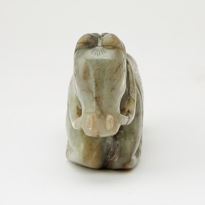 Lot 17 - A Chinese Gray Jade Carving of a Recumbent Horse