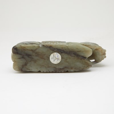 Lot 17 - A Chinese Gray Jade Carving of a Recumbent Horse