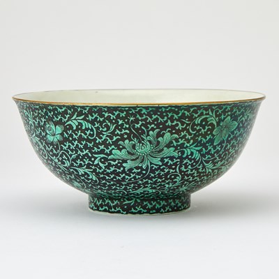 Lot 270a - A Chinese Black Ground Green Enameled 'Lotus' Bowl