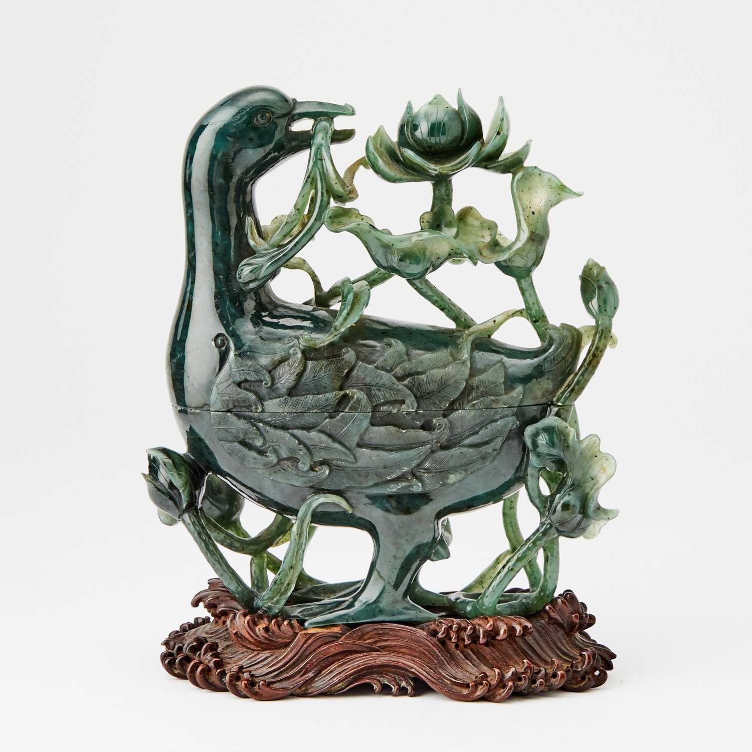 Lot 78 - A Chinese Spinach Jade 'Duck and Lotus‘ Box and Cover