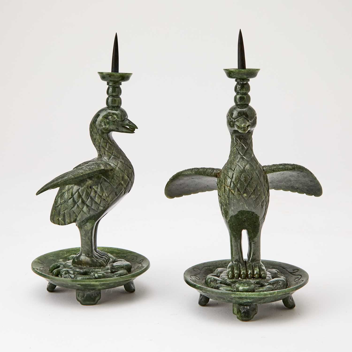 Lot 80 - A Pair of Chinese Spinach Jade 'Duck' Pricket Candlesticks