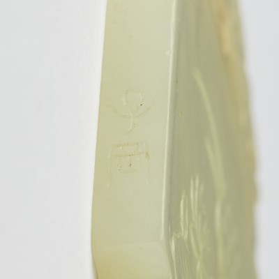 Lot 34 - A Chinese White Jade Lozenge Plaque