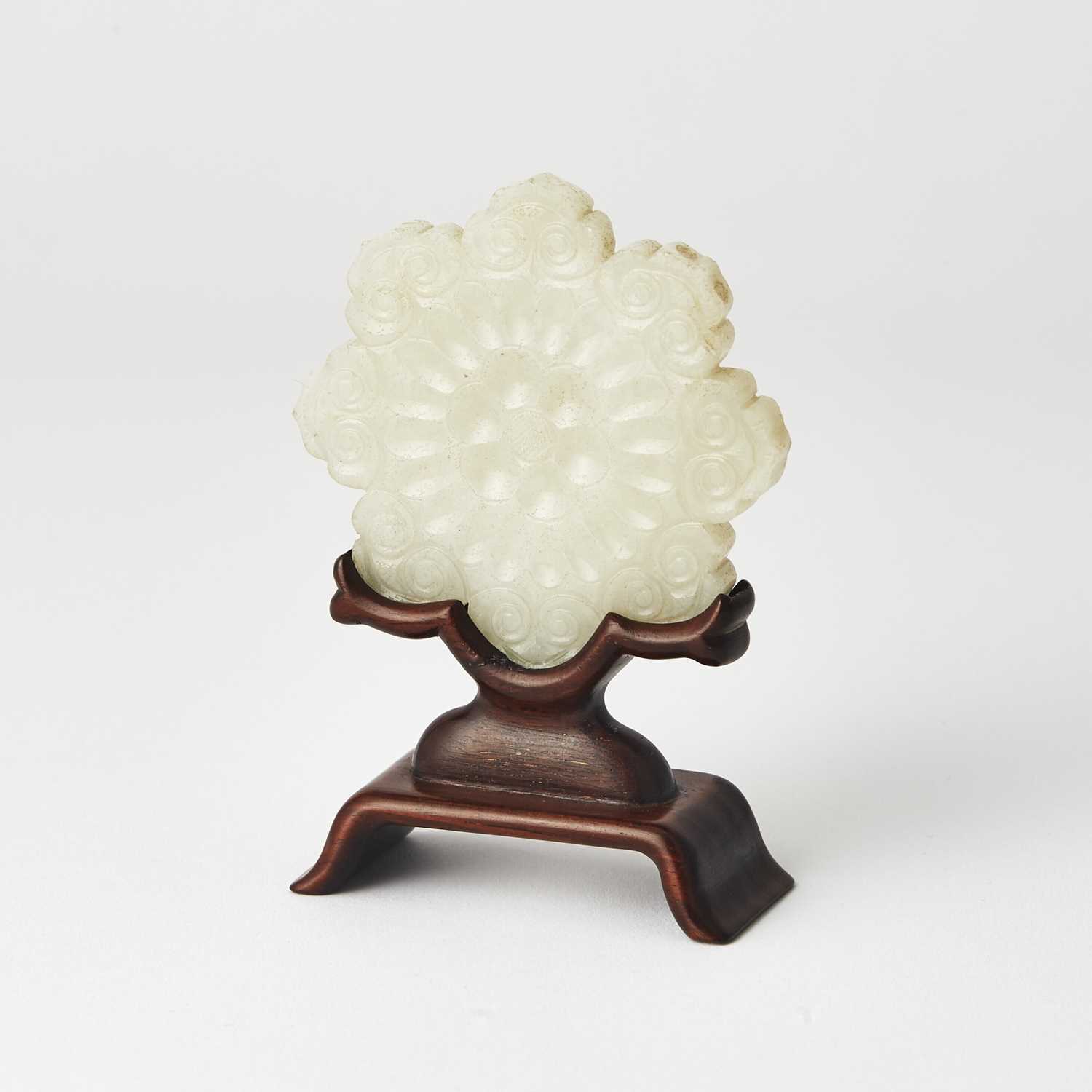 Lot 26 - A Chinese Carved Jade Plaque of a Flower and Stand