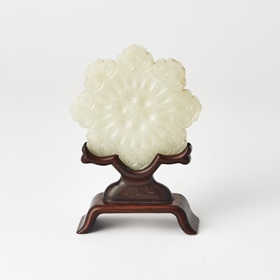 Lot 26 - A Chinese Carved Jade Plaque of a Flower and Stand