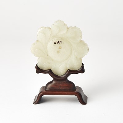 Lot 26 - A Chinese Carved Jade Plaque of a Flower and Stand