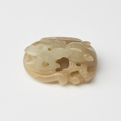 Lot 444 - A Chinese White Jade Carving of a Reclining Cat