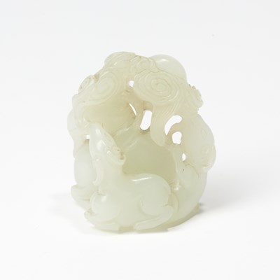 Lot 63 - A Chinese White Jade Carving of Three Rams