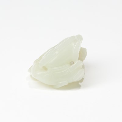 Lot 63 - A Chinese White Jade Carving of Three Rams