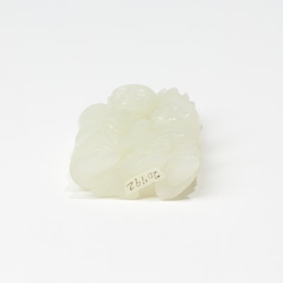 Lot 38 - A Chinese Translucent White Jade Carving of Hehe Erxian