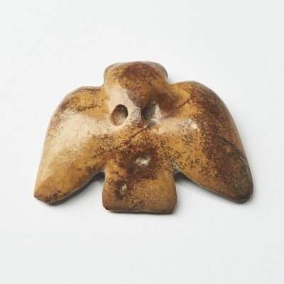 Lot 22 - A Chinese Archaistic Hongshan-Type Jade Owl Pendant