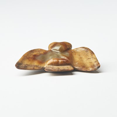 Lot 22 - A Chinese Archaistic Hongshan-Type Jade Owl Pendant